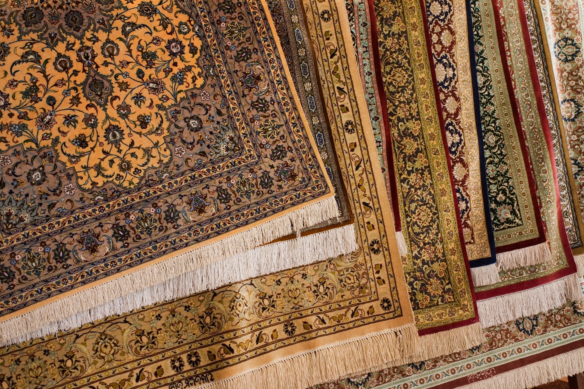 Various Persian carpet rugs in different colors